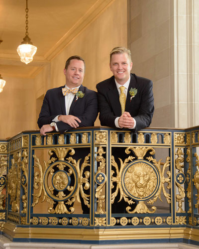 Gay City Hall Nuptials with Golden Railing in San Francisco