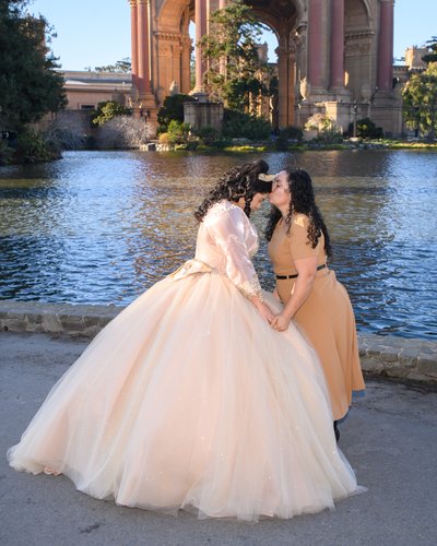 Mother Kissing Quinceanera Daughter photography