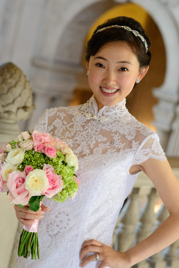 Wedding Photographer San Francisco City Hall - Asian Bride  posing while holding a Bouquet