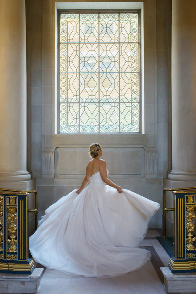 Twirling Bride in Window Light Photography