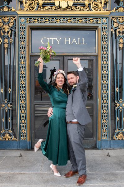 Newlyweds celebrating recent San Francisco city hall nuptials