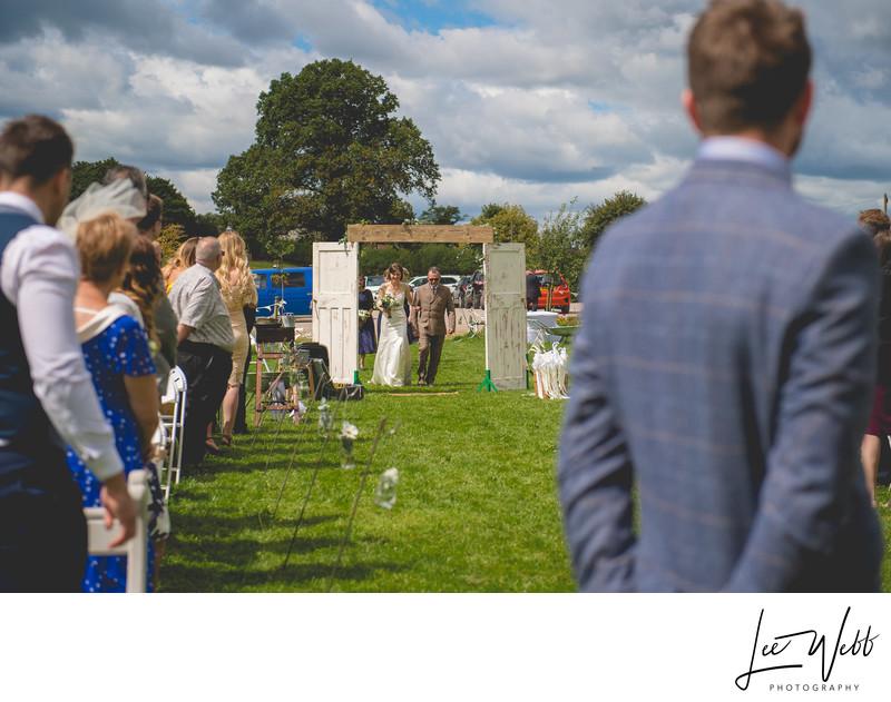 Bride Arrival Rock Village Hall Wedding