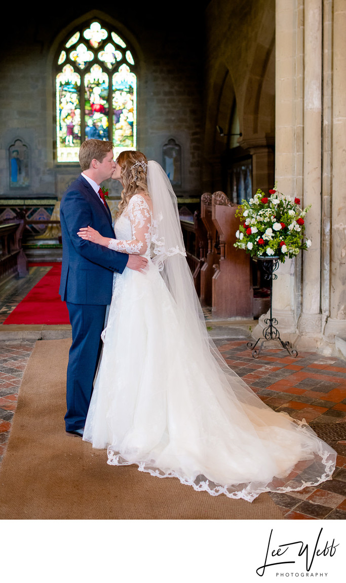 Bride and Groom First Kiss