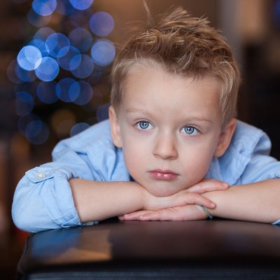 Child Portrait by his Christmas Tree