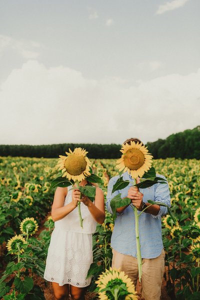 Fun engagement session at Shimon Sunflower Farm, Slinger WI