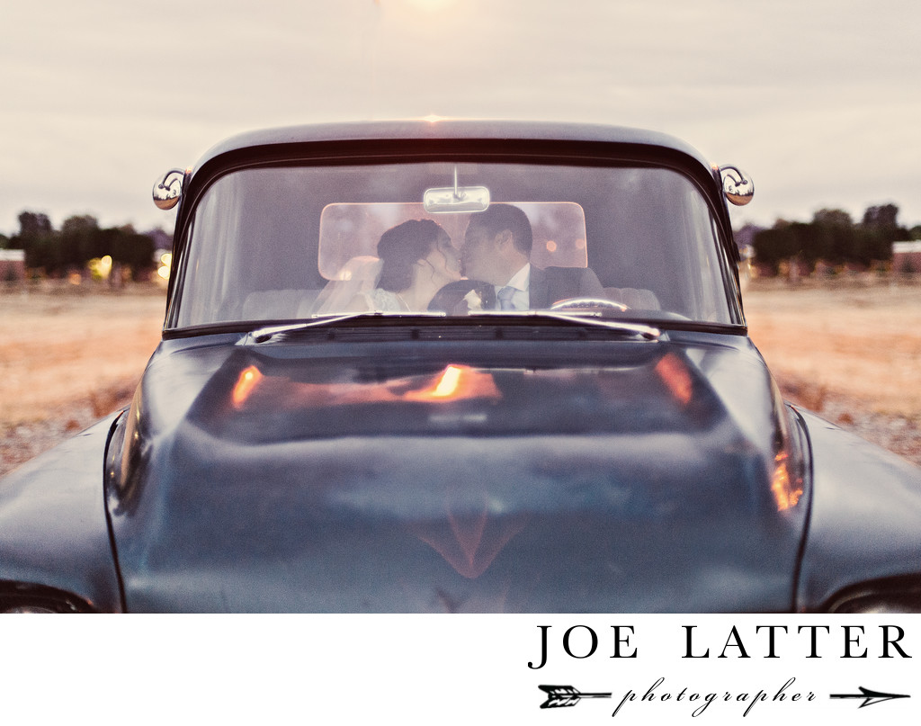 Old Pickup Truck Wedding Photograph with Bride and Groom