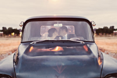 Old Pickup Truck Wedding Photograph with Bride and Groom