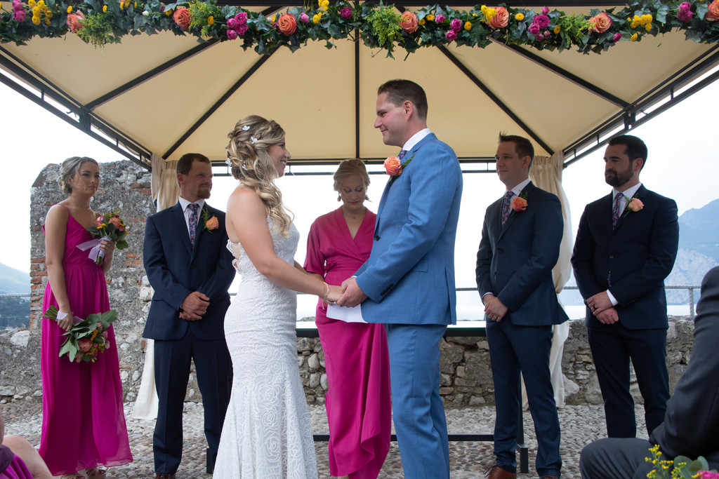 Meredith and Danny exchanging vows in Malcesine Castle