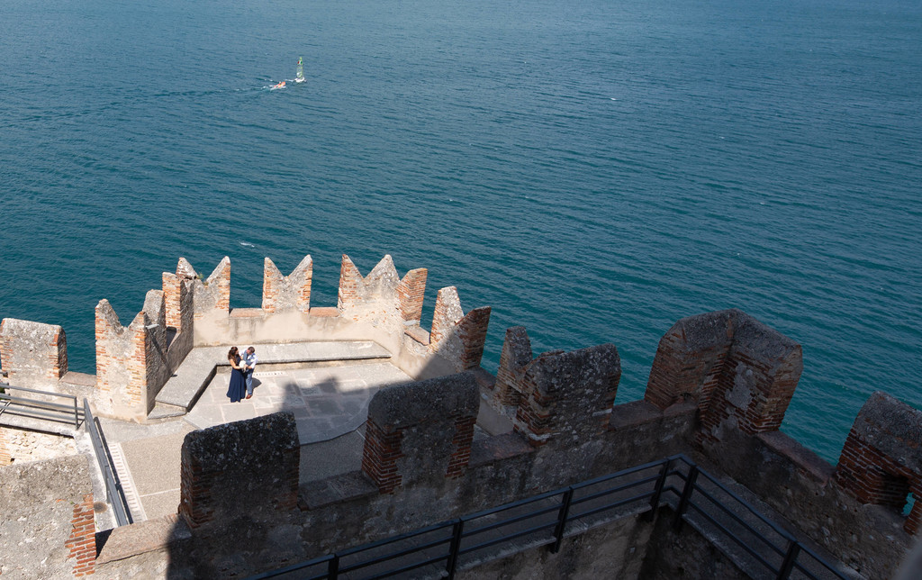 Spot the bride & groom on Castle terrace on Lake Garda