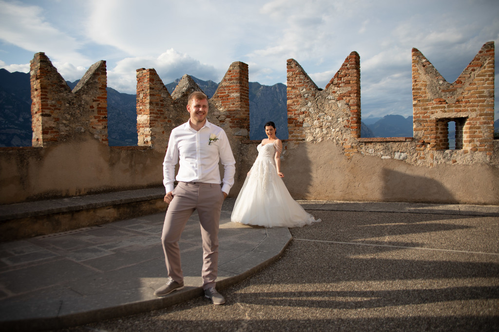 Fantastic light 5pm wedding Malcesine Castle, Italy