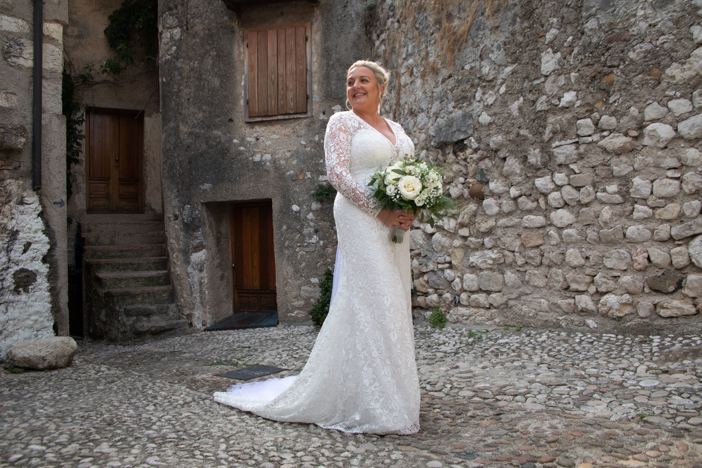 Elegant bride in the Castle of Malcesine on Lake Garda