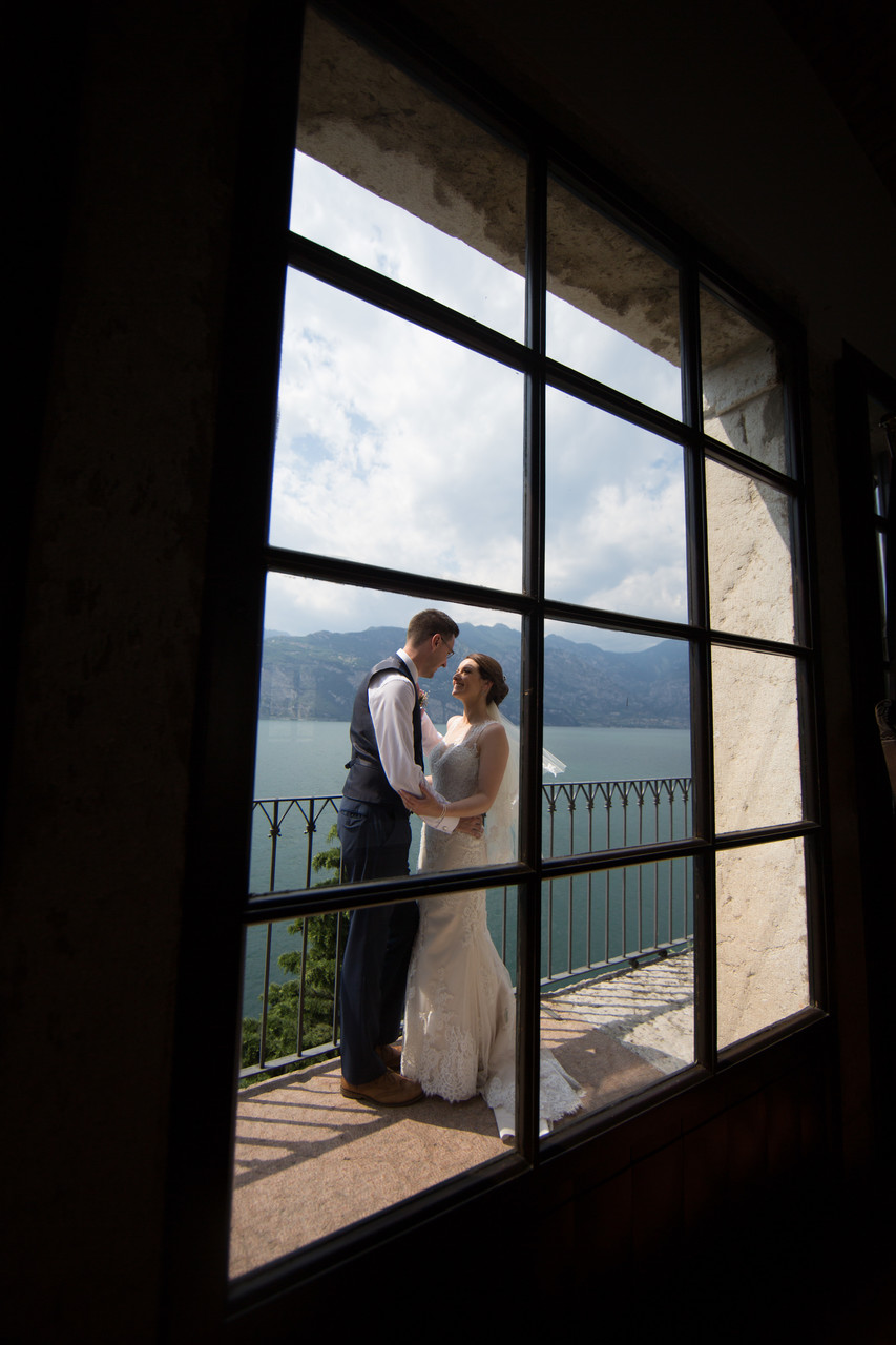 Emma and Chris through the window in Malcesine 