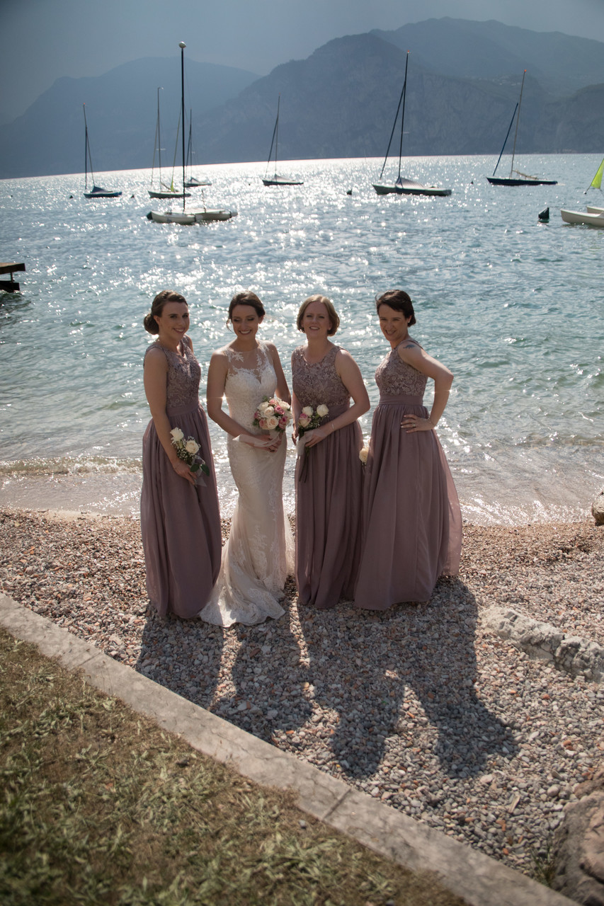 Emma and her maids by the water before the storm