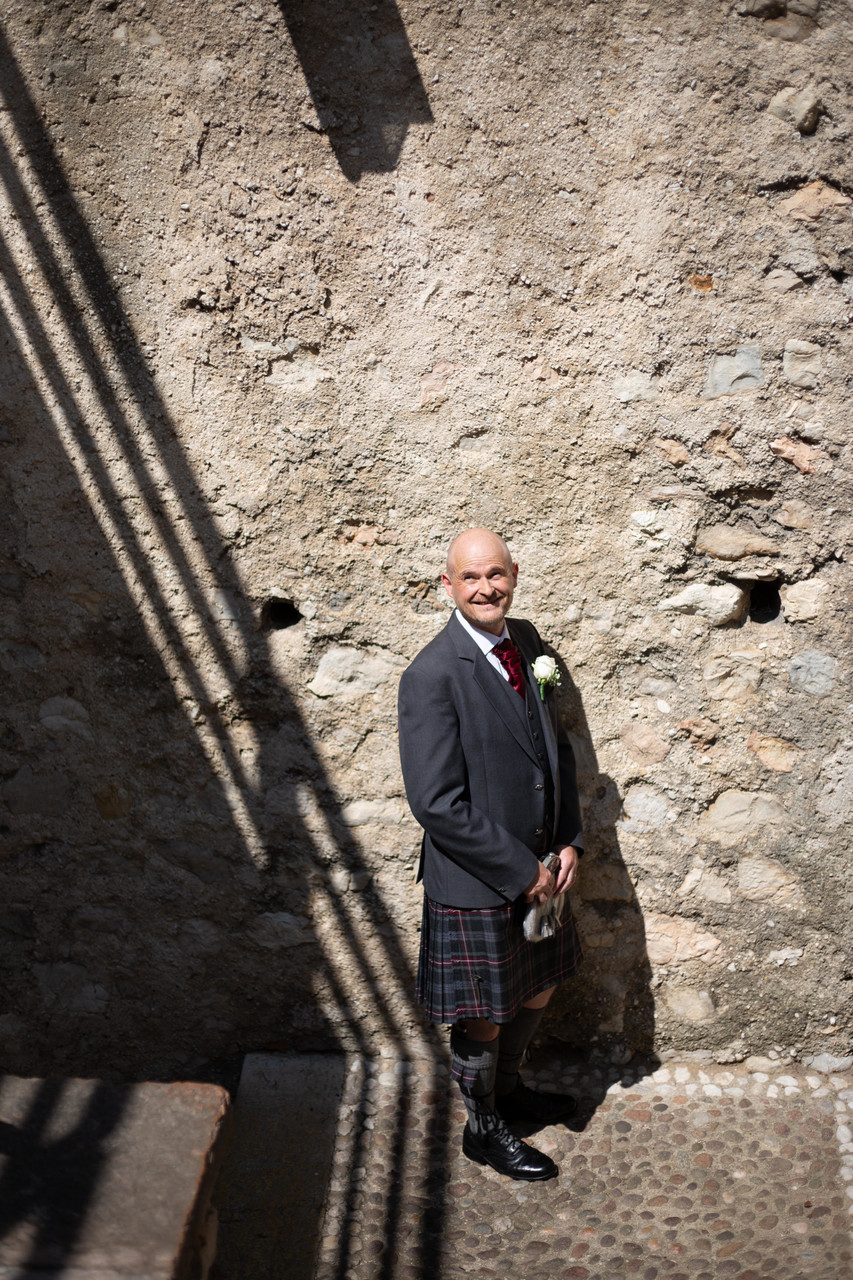 Scottish groom in Malcesine castle on his wedding day