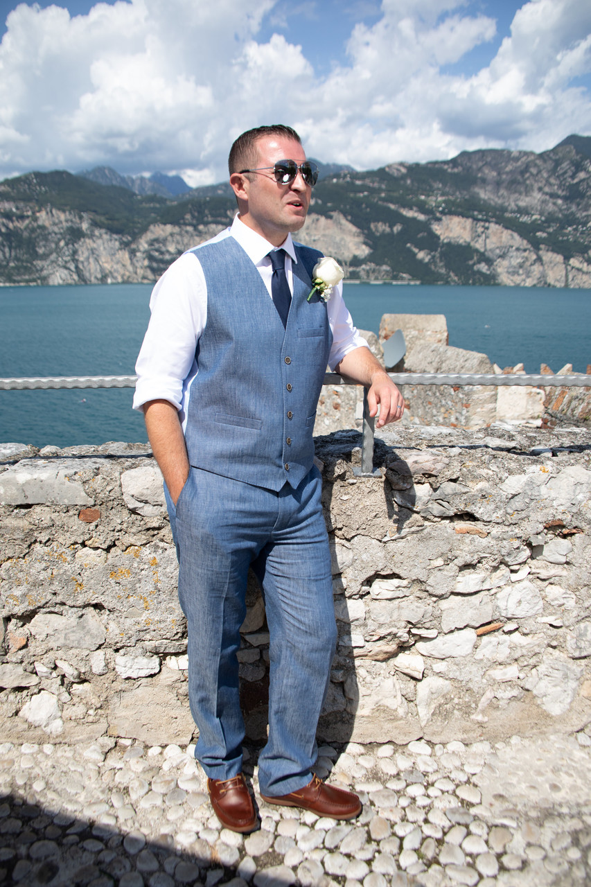 The groom chilling out after the ceremony on Lake Garda