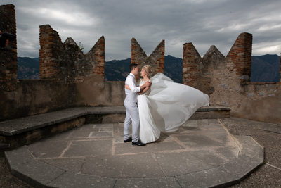 Emma and Darren chose a breezy day to marry in Italy.