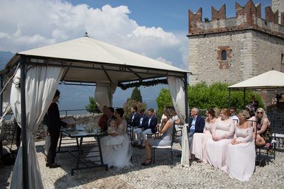 Mel and Mike wedding ceremony in Malcesine with guests