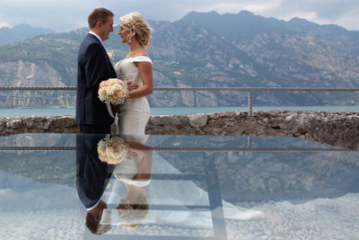Claire and Adam in a reflection in Malcesine Castle