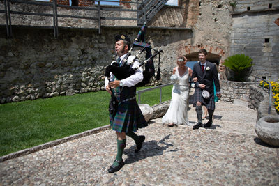 Scottish piper in Malcesine castle grounds