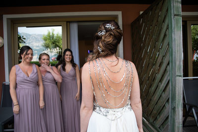Bridesmaids first look at the bride, Malcesine Castle