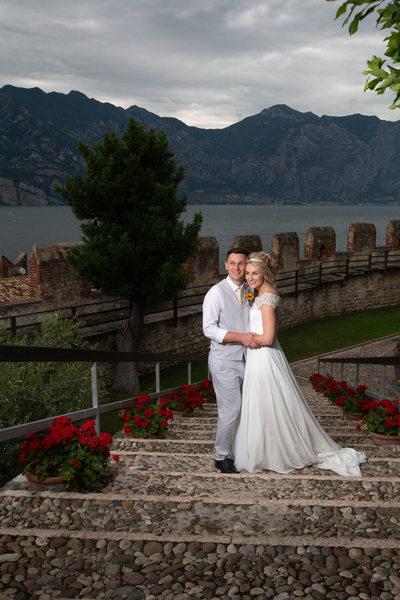 Emma and Darren  on the steps in Malcesine Castle