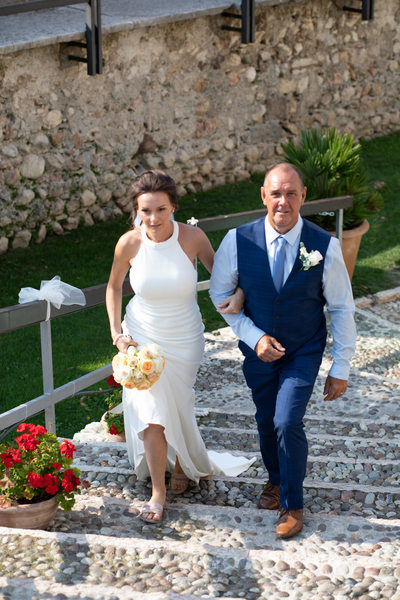 Kim & Gareth wedding in Malcesine Castle, Bride and Dad