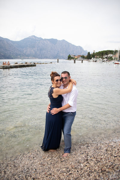 Bride & groom paddling on Lake Garda in Malcesine