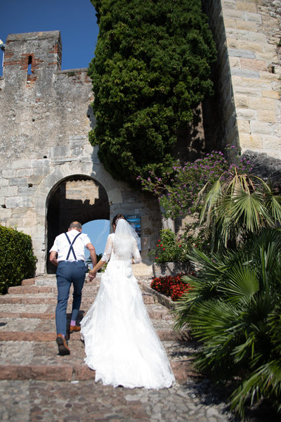 Lisa and her Dad, final steps. Malcesine Castle, Italy.
