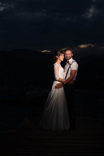Spotlight on bride & groom on Lake Garda