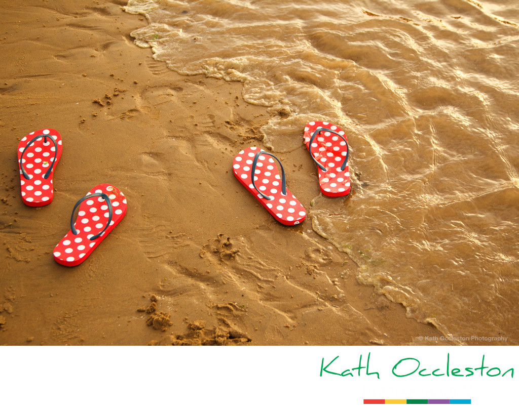 Wedding flip flops on the beach