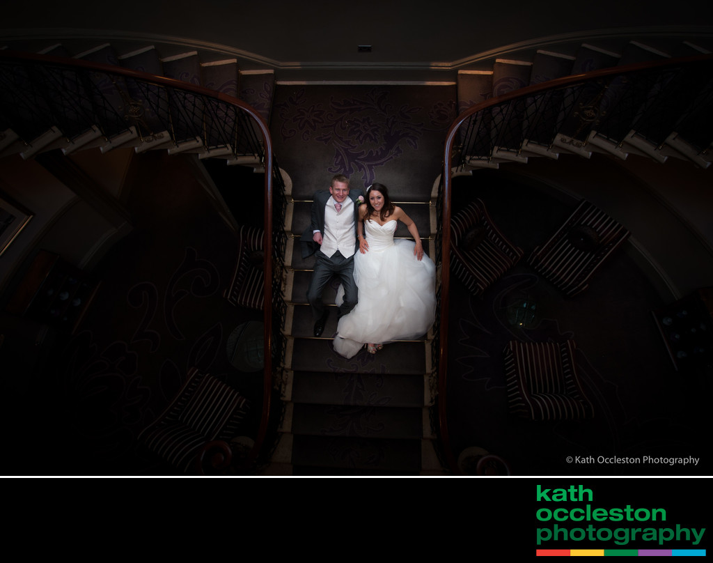creative wedding portrait on staircase