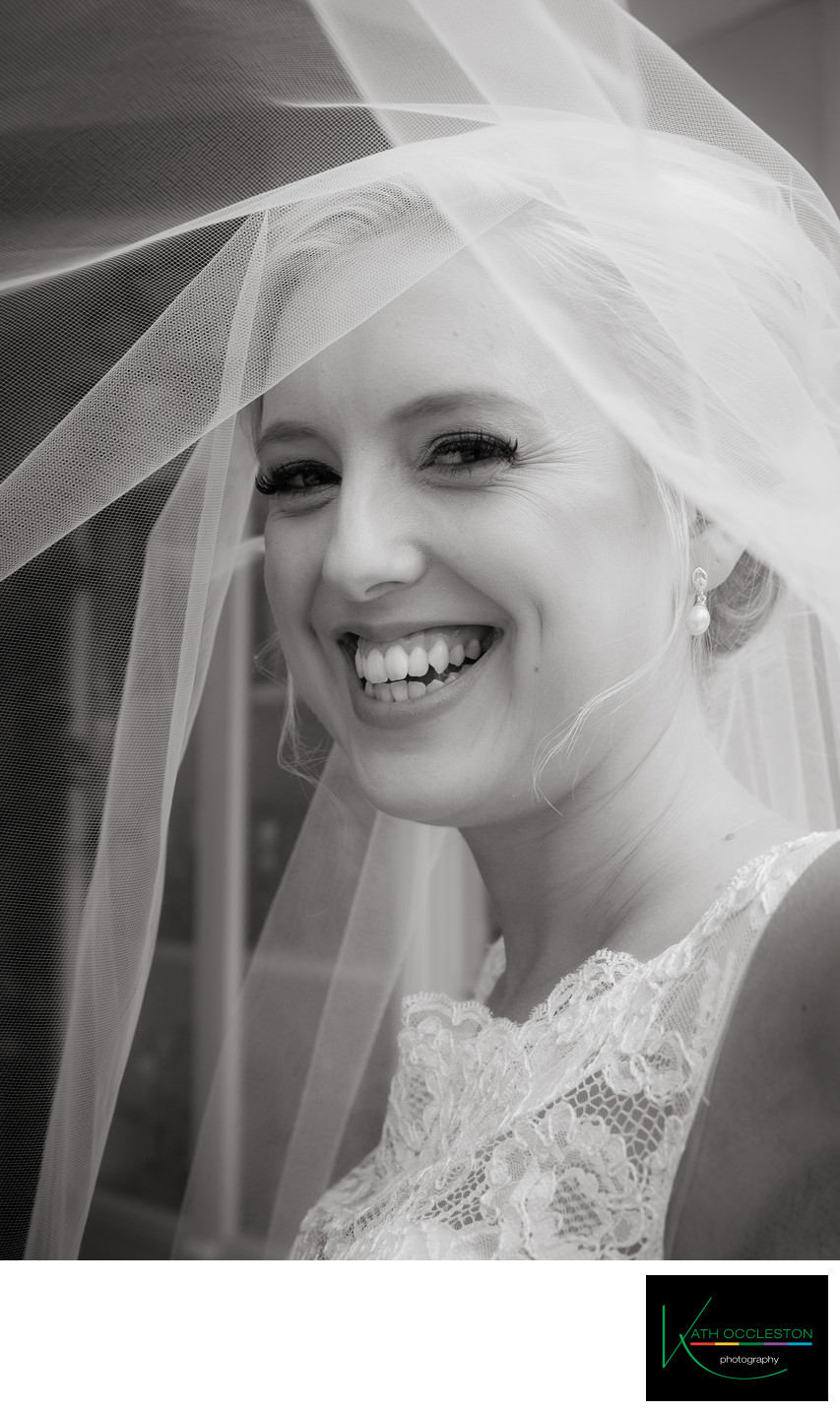 Happy bride under the veil!