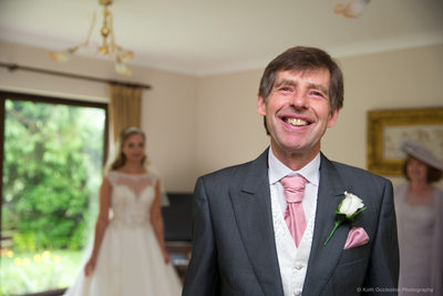 Dad seeing his daughter in her wedding dress