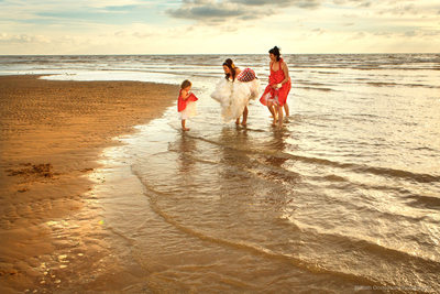 Bride & bridesmaids in the sea at Blackpool
