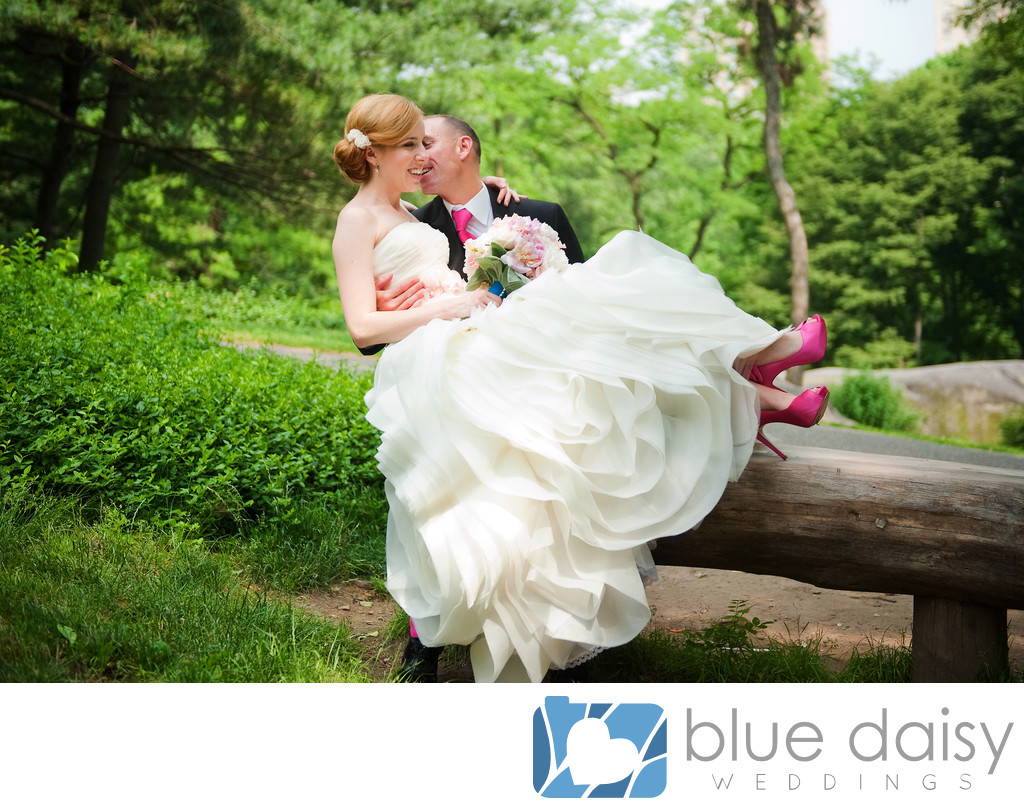 Wedding couple sitting on Central Park bench NYC