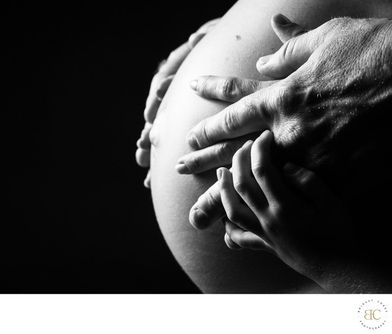 Intimate Black and White Maternity Portrait with Hands