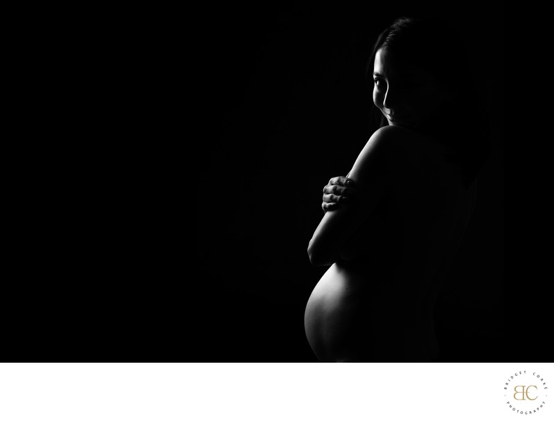 Dramatic Maternity Portrait in Low Key Light