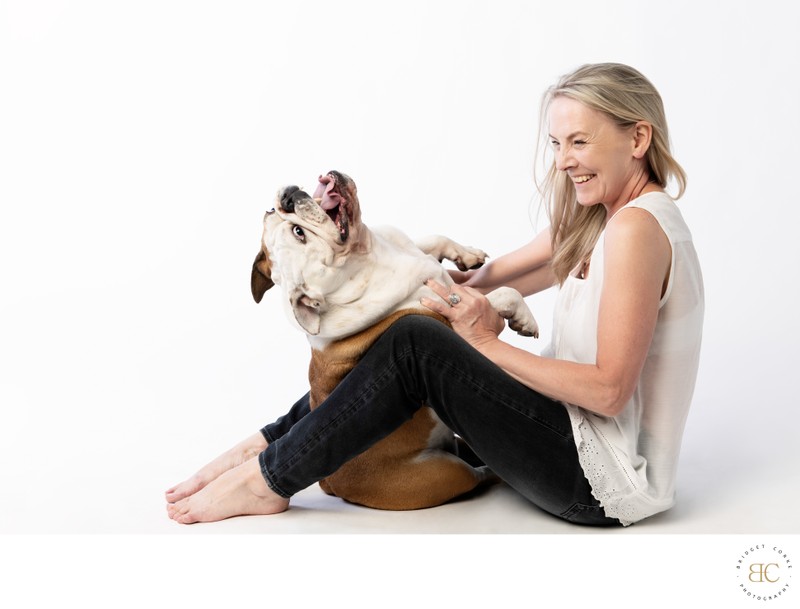 Bridget Corke with her bulldog in studio