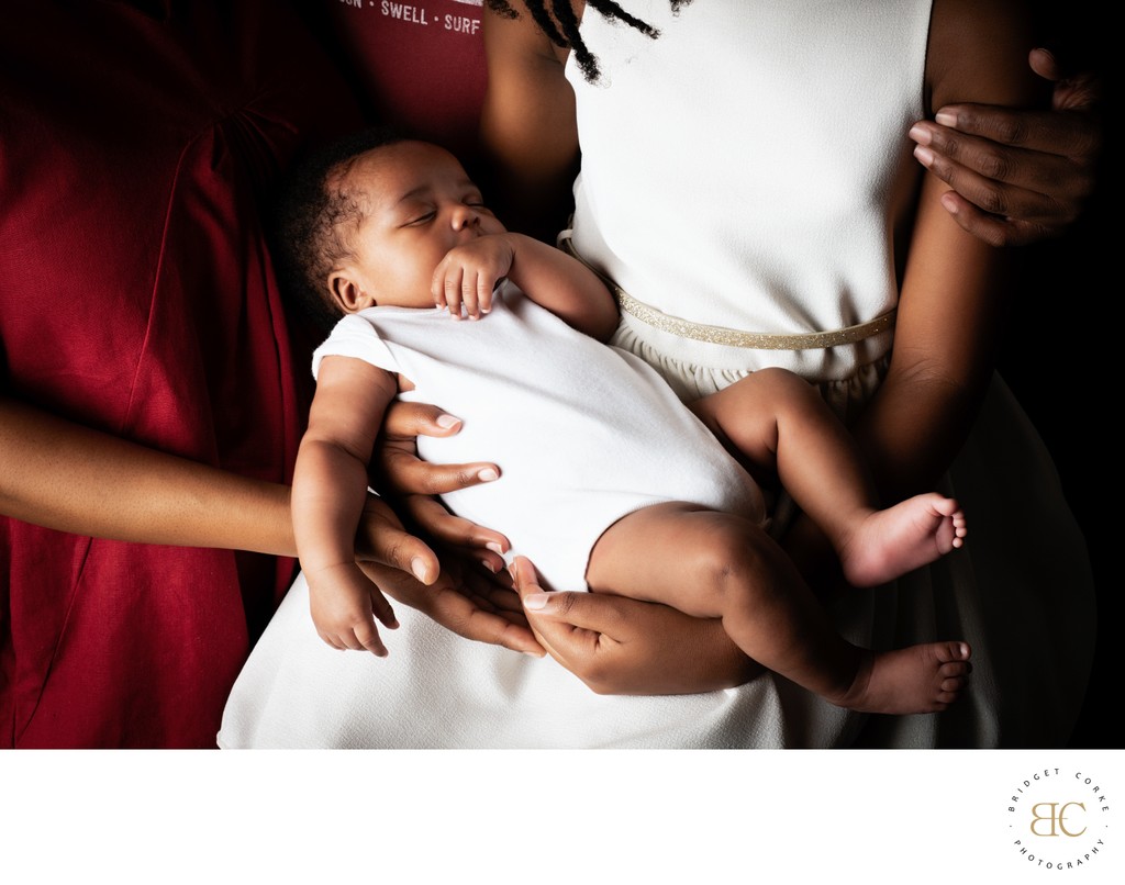 Newborn Sleeping Family Arms