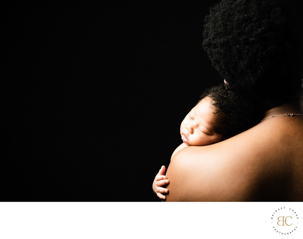 Newborn Sleeping Mothers Bare Shoulder