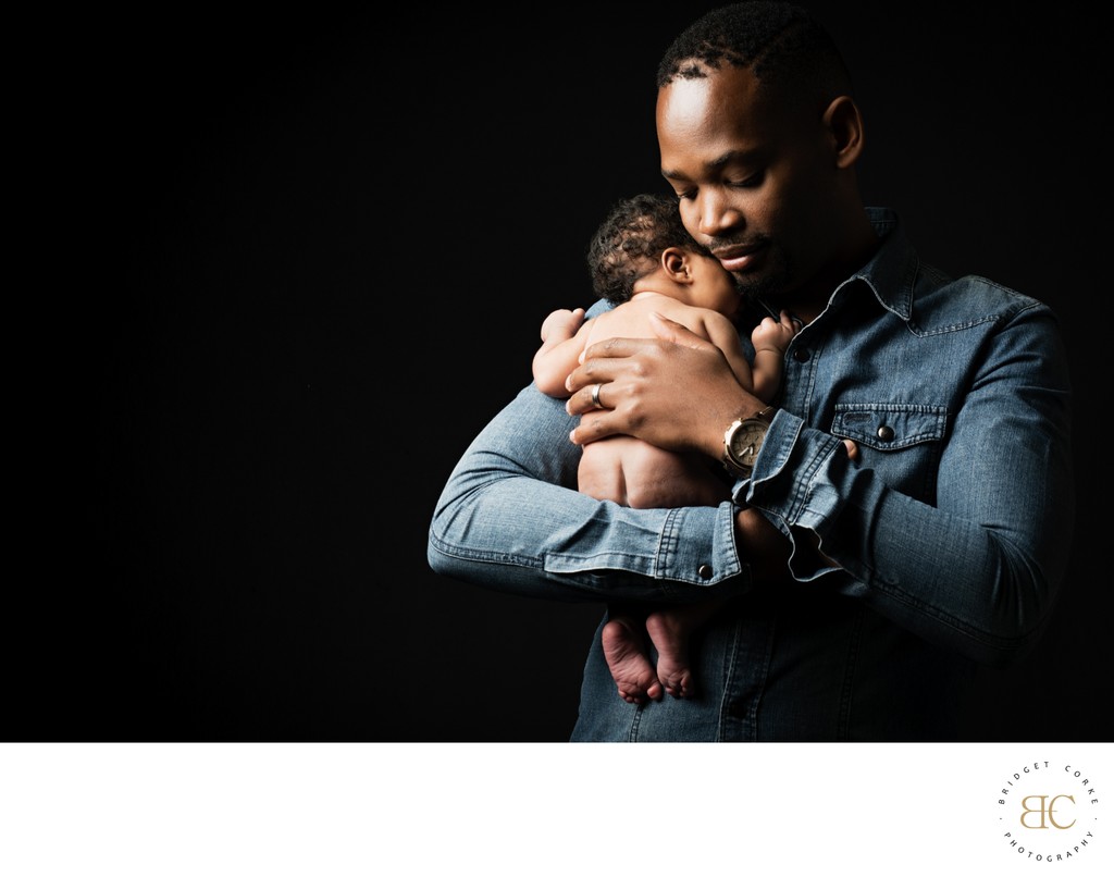 Newborn Sleeping On Dad's Shoulder