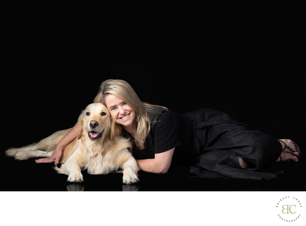 Golden Retriever & Woman Lying