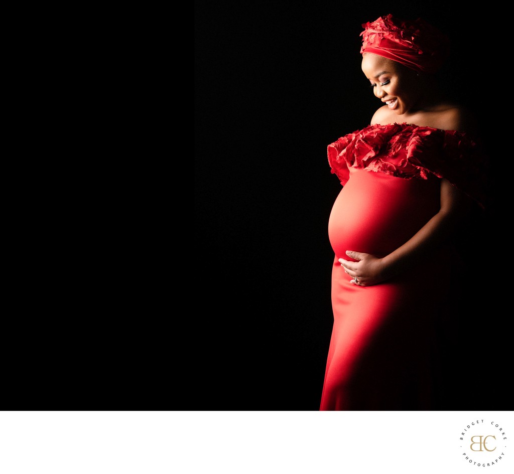 Radiant Maternity Portrait in Red Gown