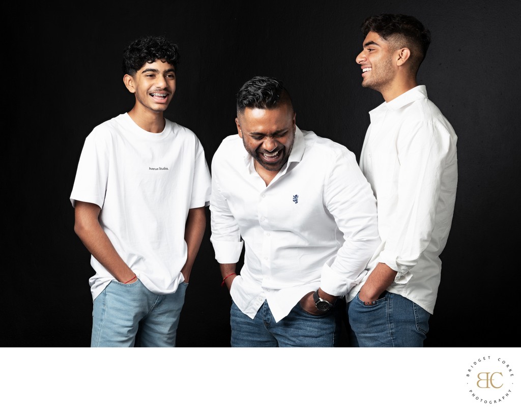 Father and Sons Laughing Together in Portrait