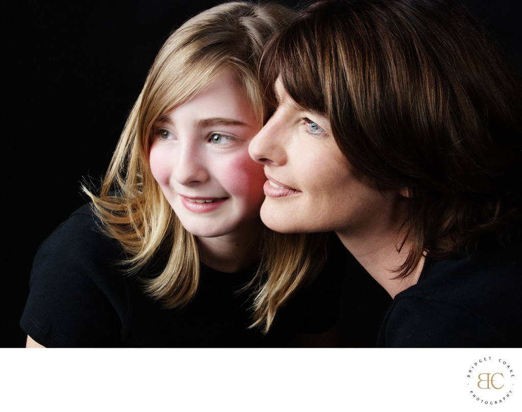 Radiant Mother and Daughter Studio Portrait