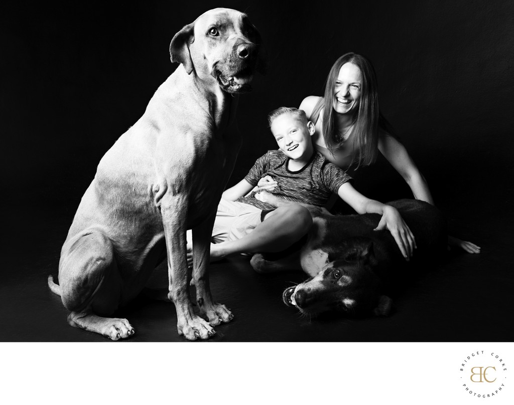 Black-and-White Family Portrait with Dogs