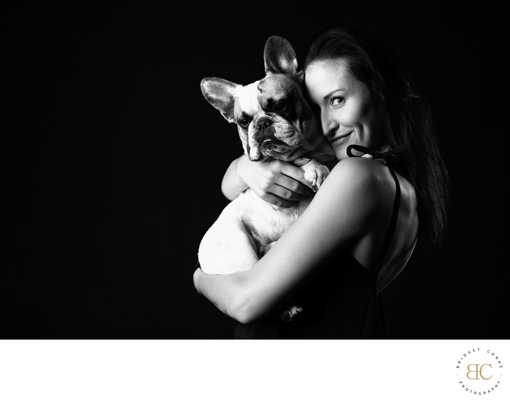 Black-and-White Portrait of Woman and French Bulldog