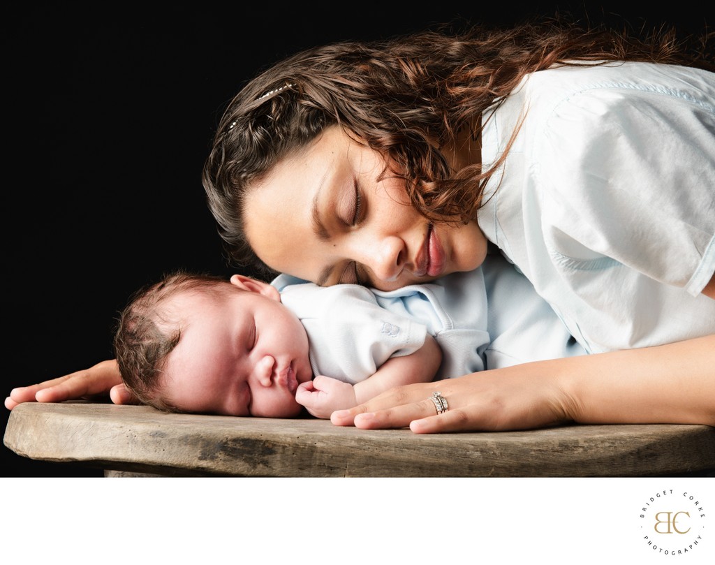 Mother and Newborn Sleeping Peacefully Together