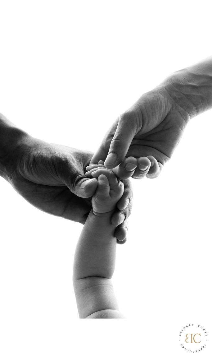 Family Hands Newborn Connection