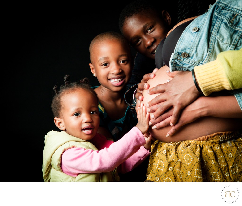 Siblings Sharing Love with Mother’s Baby Bump